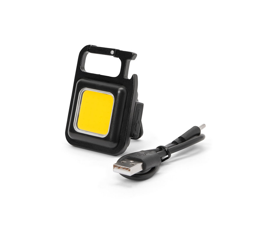 Fekete multifunkcionális lámpa töltőkábellel.