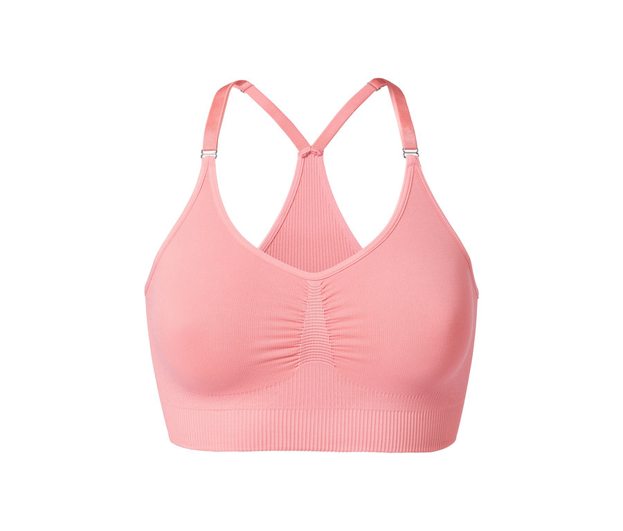 Egy rózsaszín női bustier sportmelltartó közeli képe.