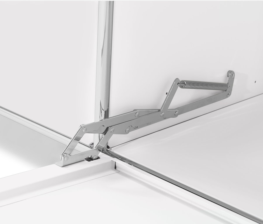 Egy fehér CN3 komód lenyíló mechanizmusának részlete.