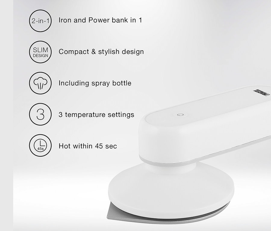 Közeli kép egy fehér akkumulátoros úti vasalóról külső akkumulátorral.