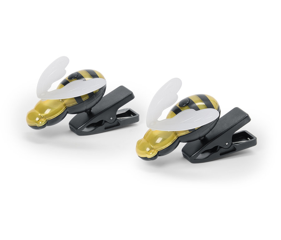 Két méhecske csíptetős lámpa fekszik egy fehér háttéren.