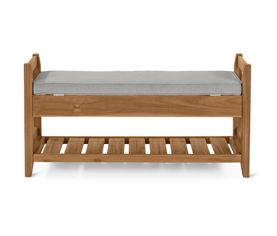 Kárpitozott pad, tárolóval és szürke párnával.