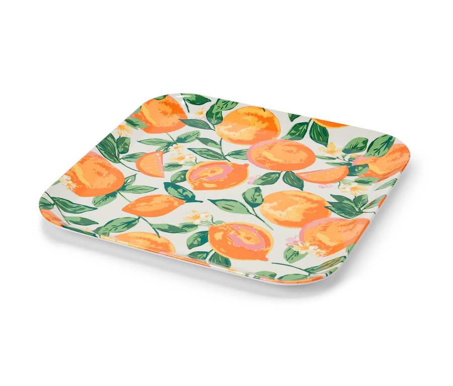 Dekoratív tálca citrus- és virágmintával.