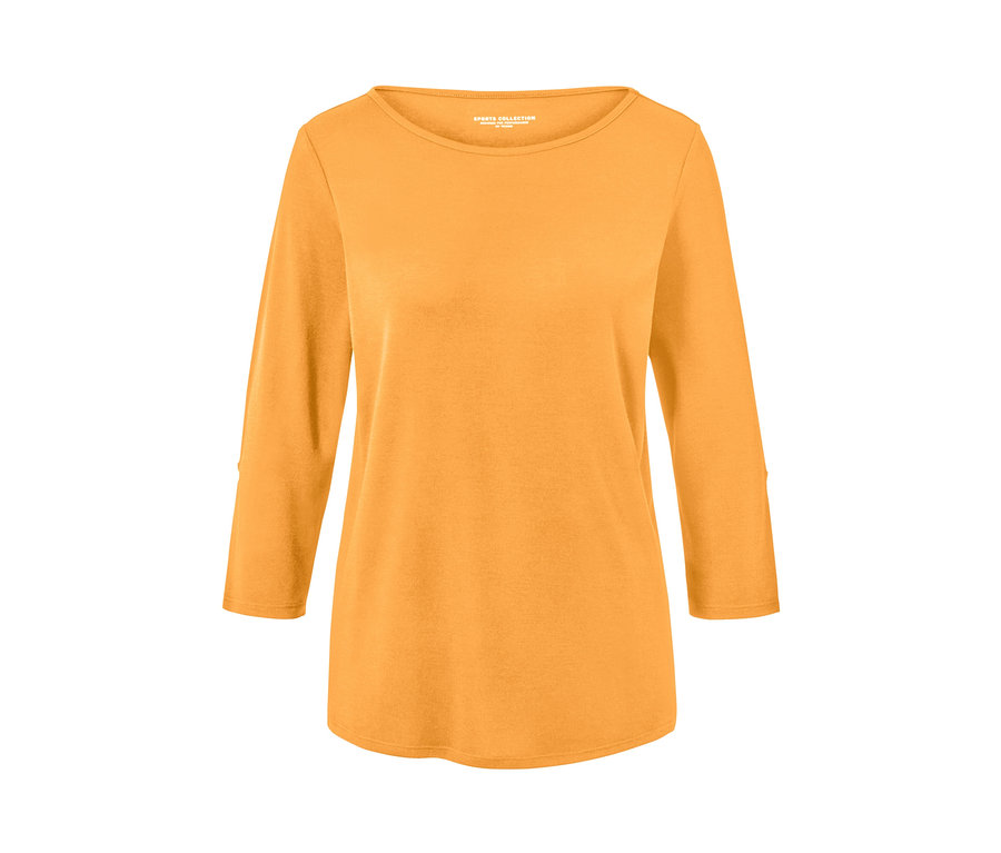 Narancssárga, 3/4-es ujjú funkcionális felső.