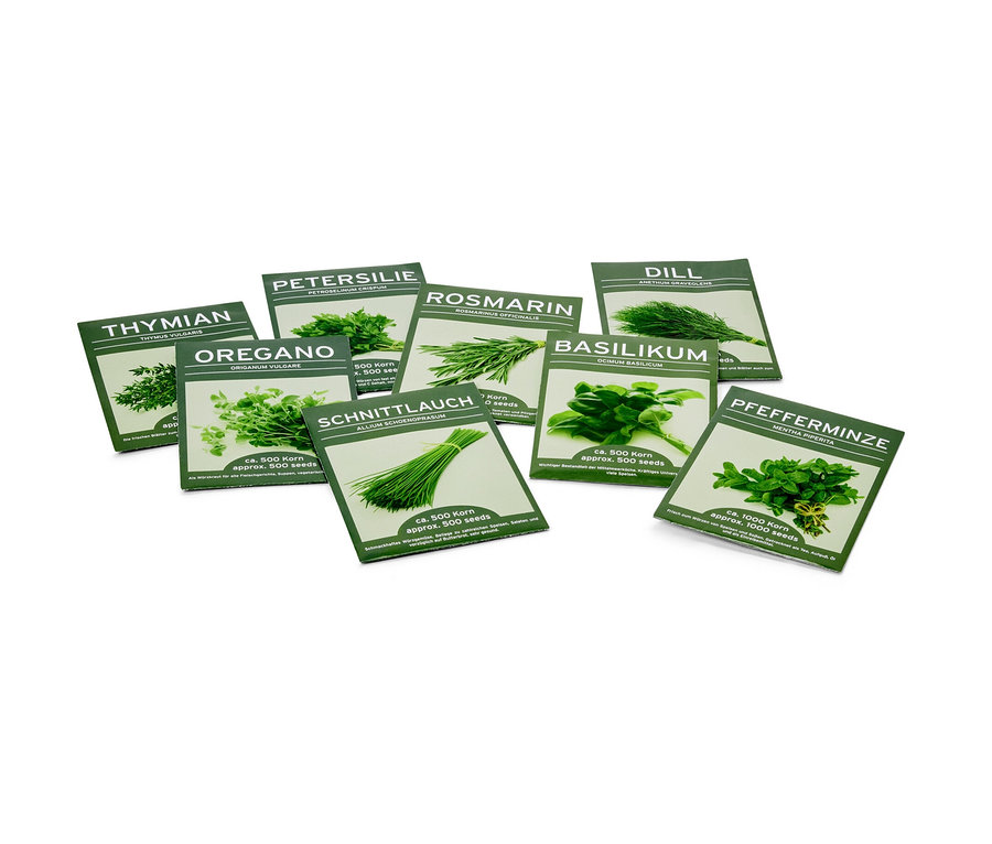 A képen a 8 klasszikus fűszernövénymag csomagjai láthatók, köztük a kakukkfű, az oregano, a petrezselyem, a rozmaring, a snidling, a kapor, a bazsalikom és a borsmenta.