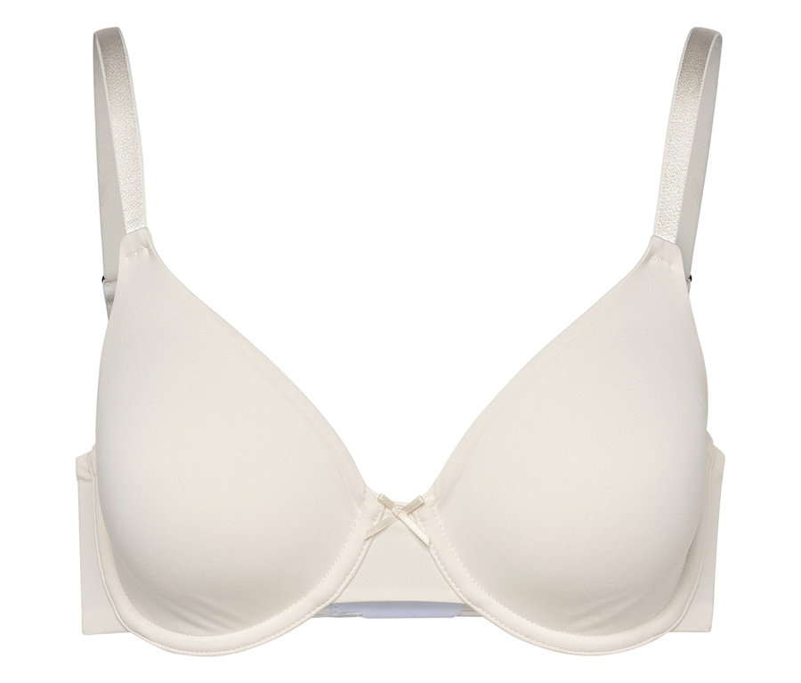 Egy krémszínű merevítős melltartó masnival a közepén.