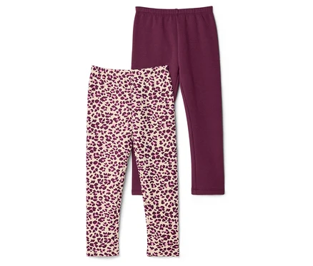 Két leggings van egymáson, az egyik egyszínű borvörös, a másik leopárdmintás bézs és borvörös színben.