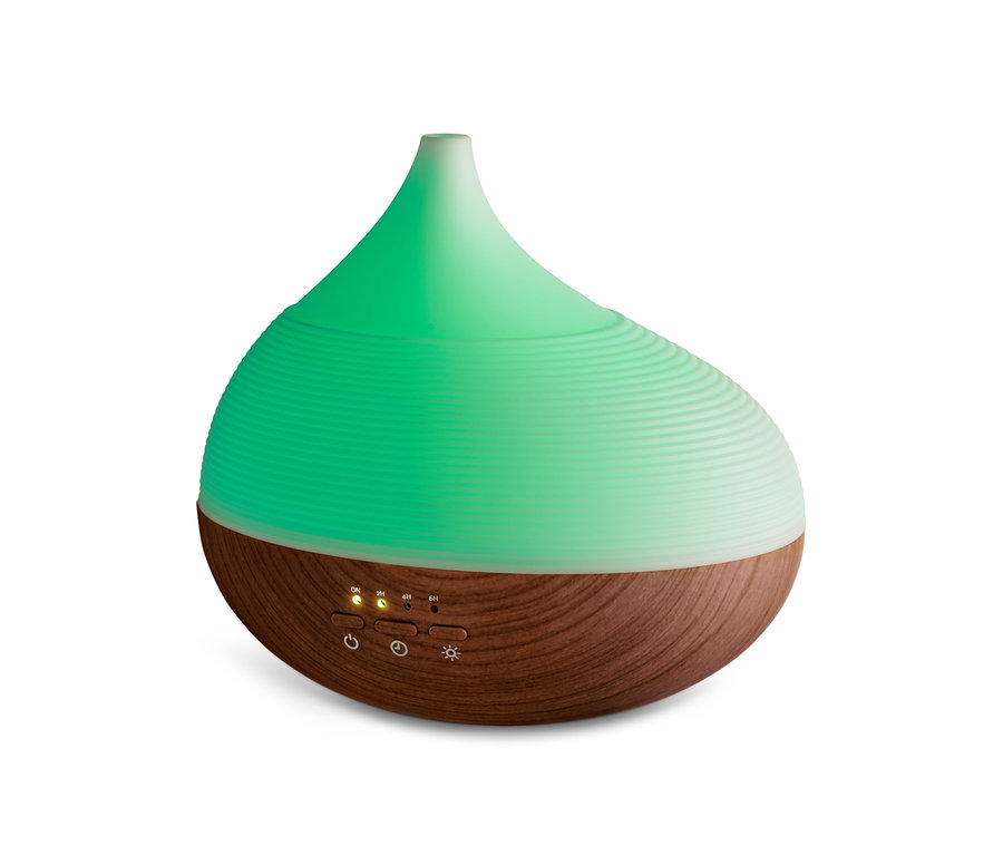 Aroma diffúzor zöld fényekkel.