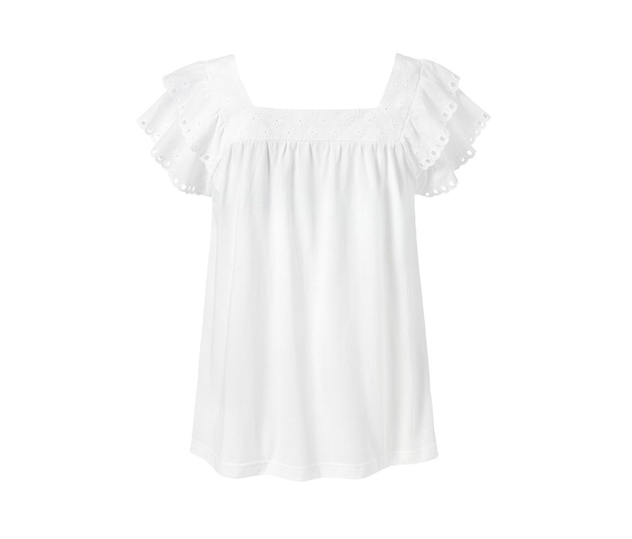Fehér, hímzett póló fodros, rövid ujjakkal.