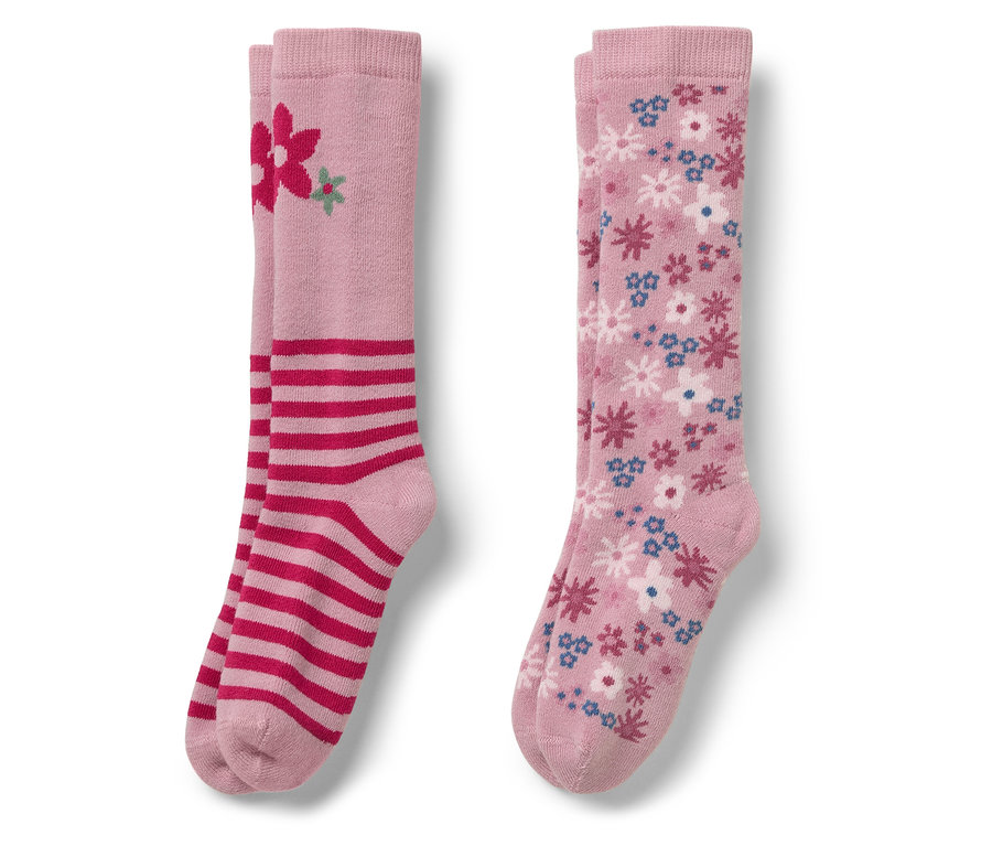 Két pár rózsaszín térdzokni. Az egyik piros csíkos és virágos, a másik virágmintás.