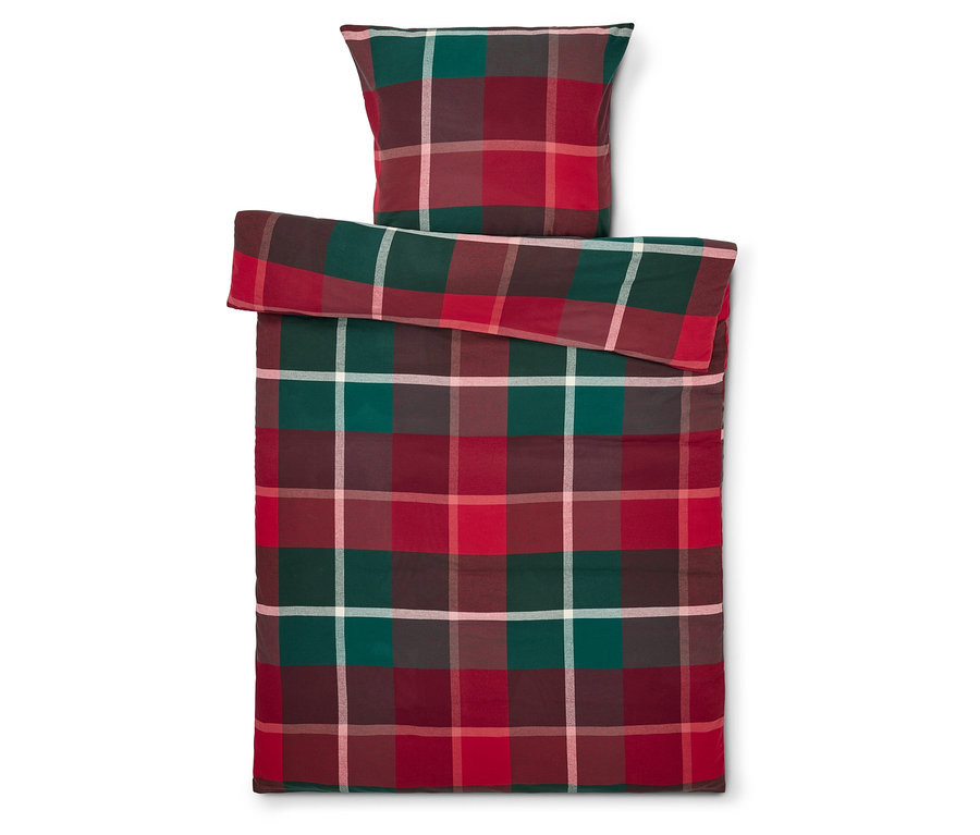 Ágytakaró és párna kockás mintával piros, zöld és fehér színekben.