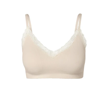 Egy krémszínű, női seamless bustier melltartó részlete.