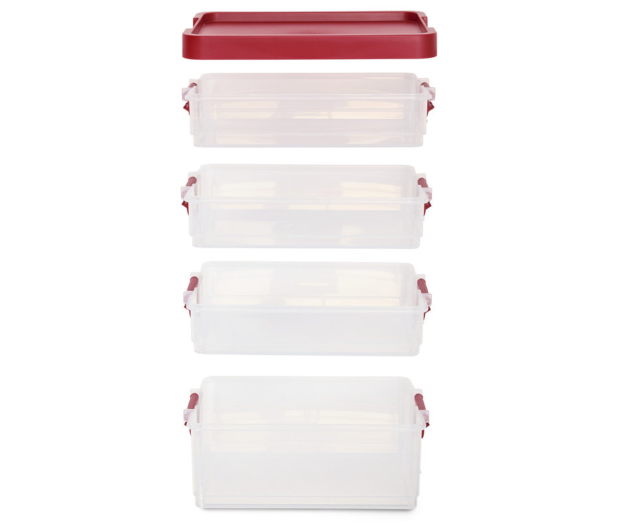 Négy átlátszó műanyag tartály egymásra rakva, a tetején egy fedővel.