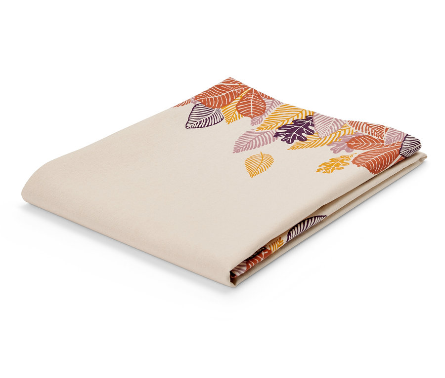 Hajtogatott bézs színű szövet levélmintával narancs, lila és sárga árnyalatokban.