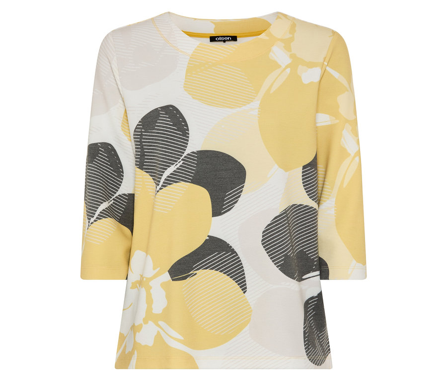 Egy hosszú ujjú ing sárga és szürke virágmintákkal.