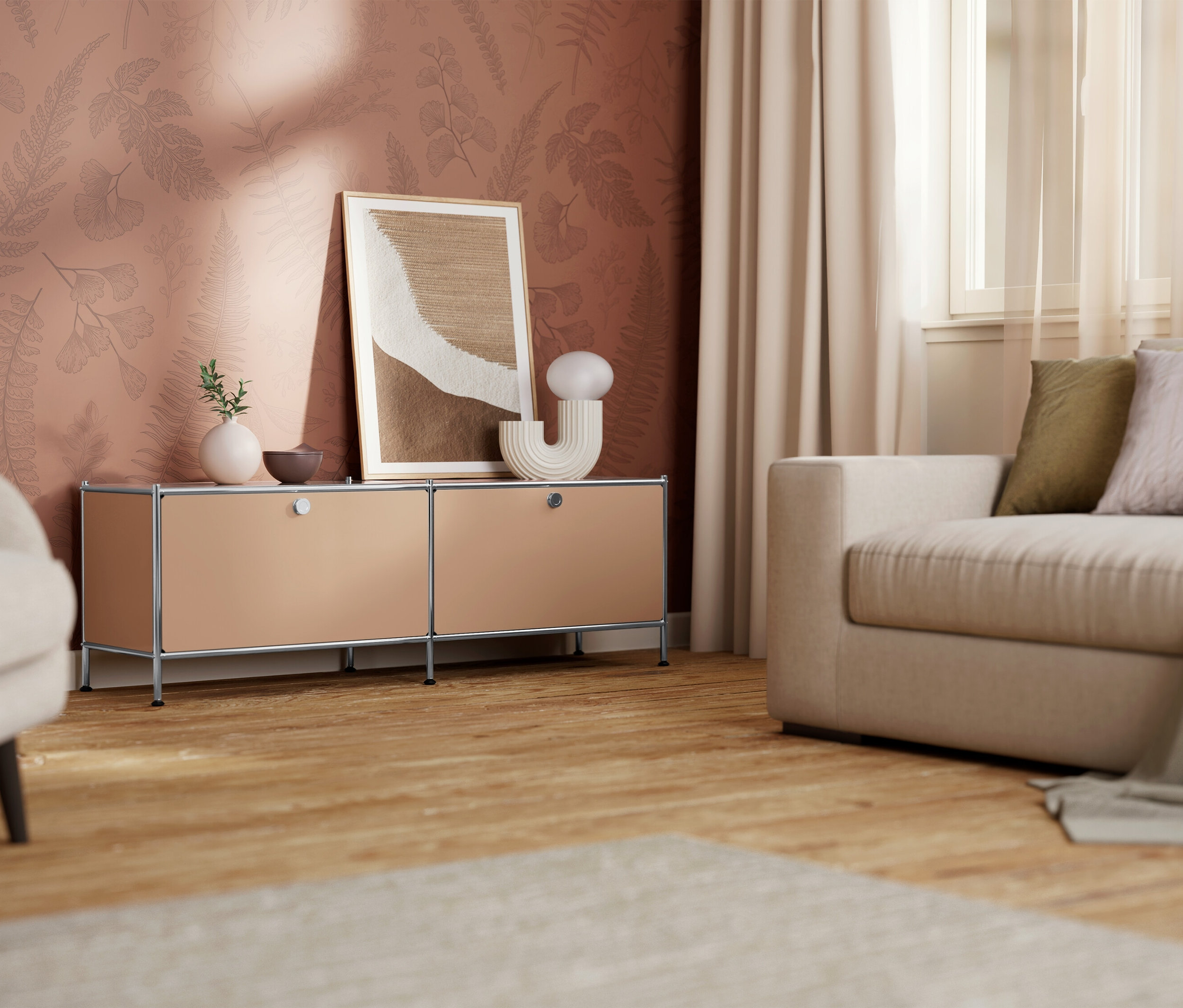 Nappali bézs komóddal, képpel és kanapéval.