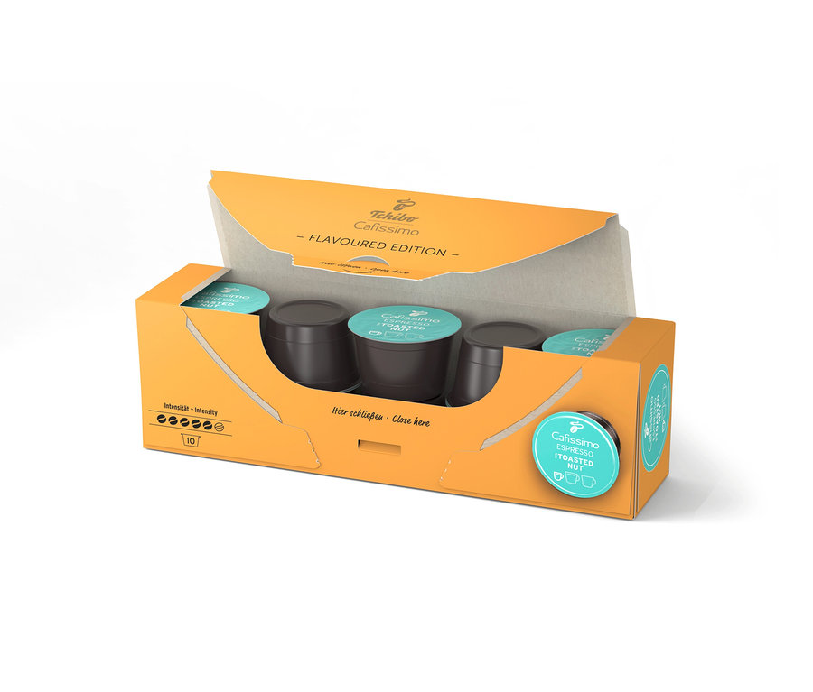 Nyitott, narancssárga Cafissimo Flavoured Espresso Toasted Nut csomag 10 kapszulával, a kapszulák láthatók belül.
