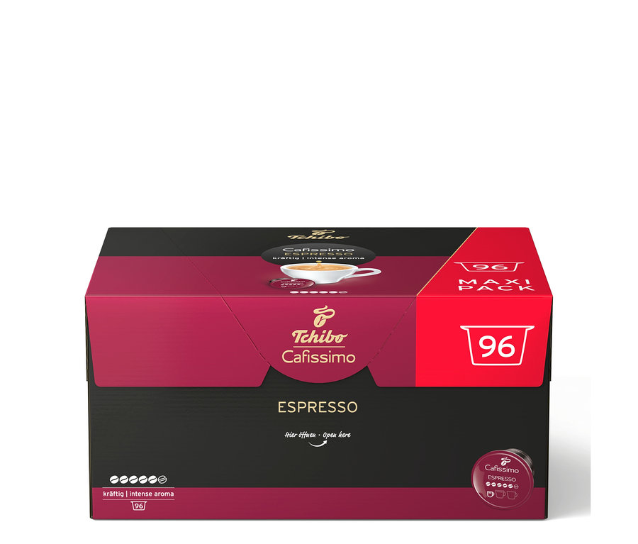 Piros és fekete Tchibo Cafissimo Espresso csomag 96 kapszulával, eszpresszó csészével és intenzitásjelzővel.