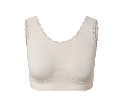 Krémszínű, varrat nélküli, csipkés bustier.
