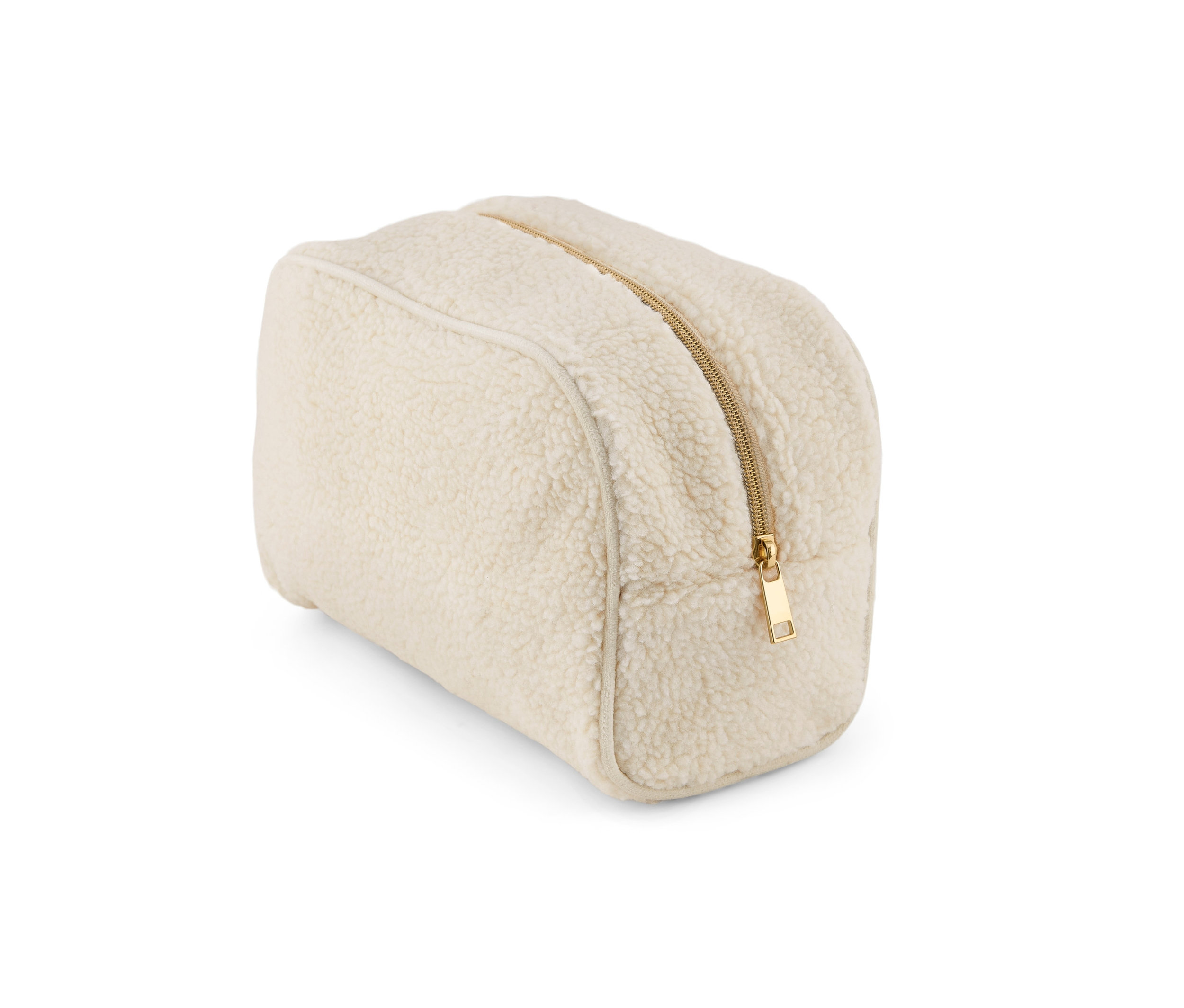 Egy krémszínű neszesszer texturált felülettel és arany cipzárral.