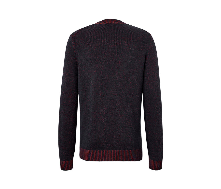 Sötétkék gyapjú kötött pulóver piros részletekkel.