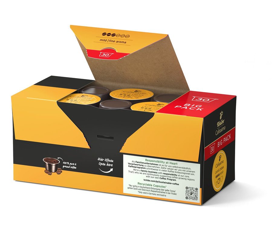 Nyitott sárga-fekete doboz kávékapszulákkal.