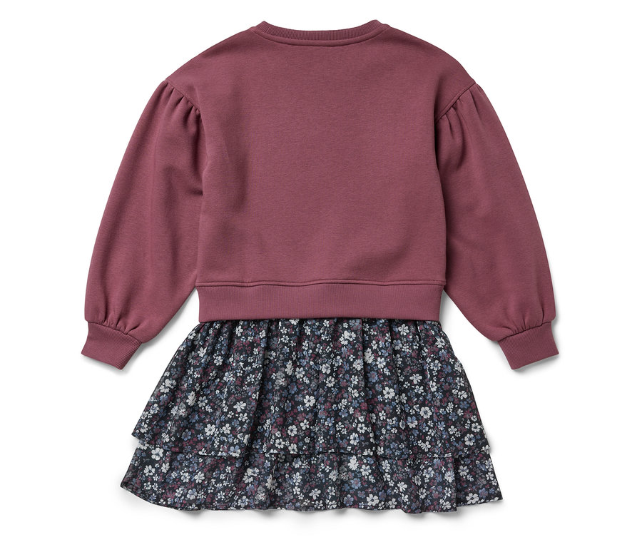 Hosszú ujjú ruha lila felsőrésszel és virágos szoknyával.