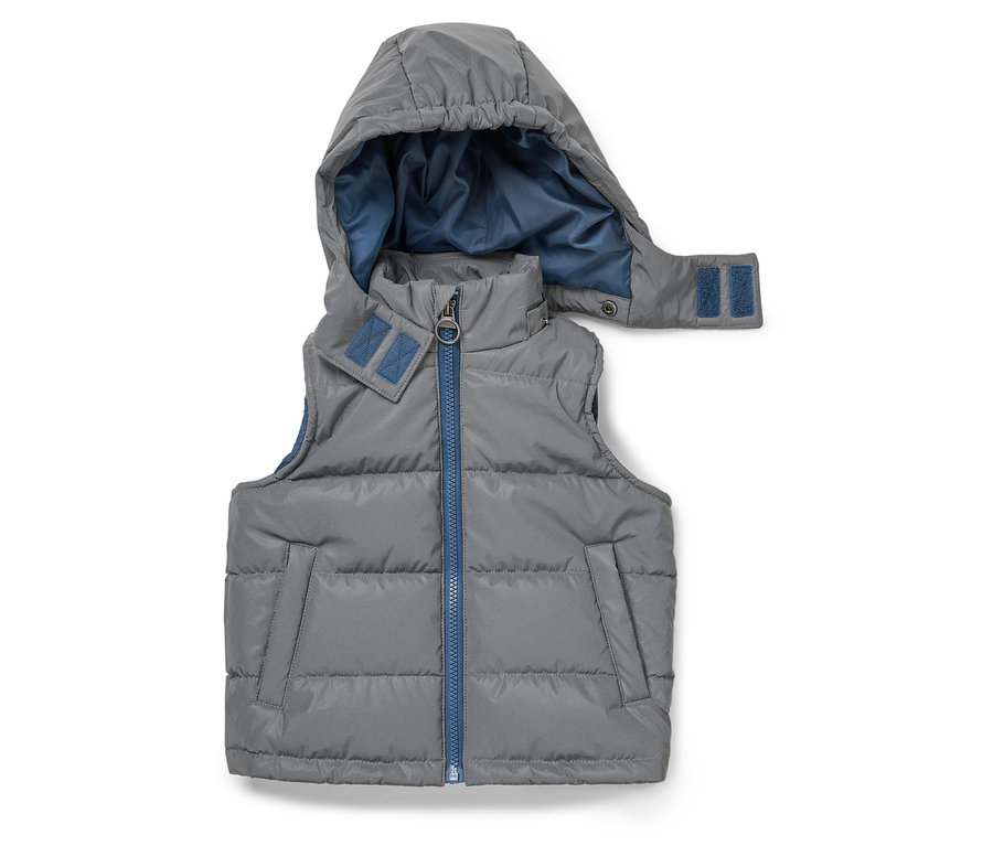 Szürke, steppelt mellény kapucnival és kék cipzárral.