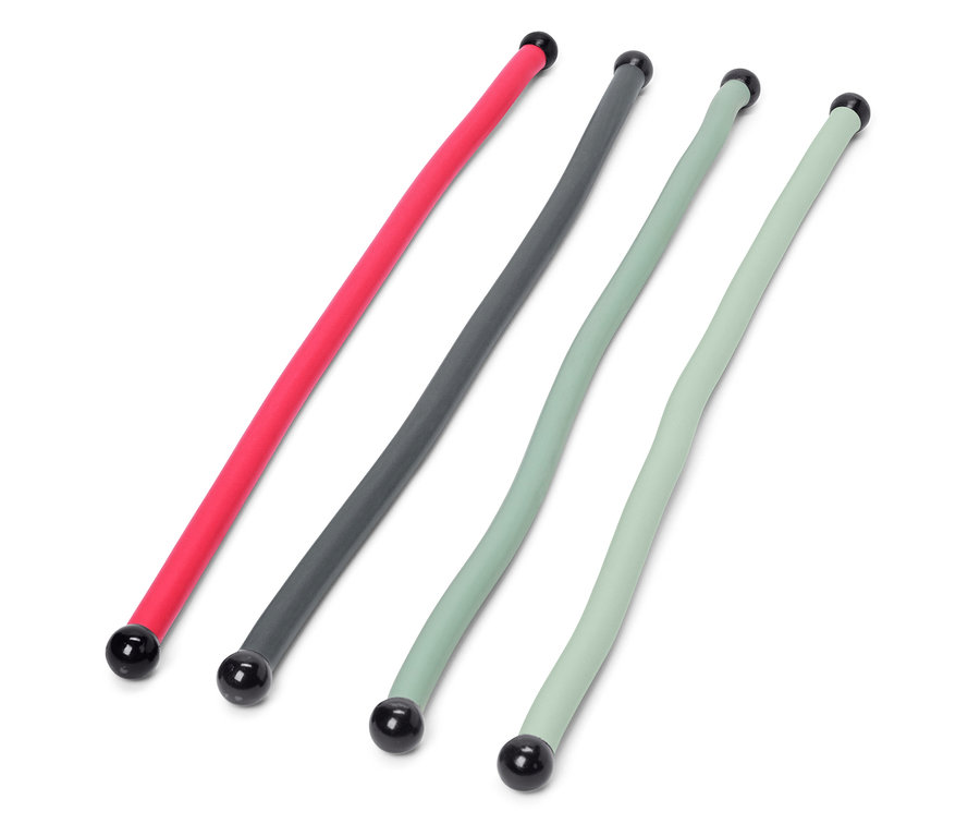 Négy Power Kabelbinder piros, szürke és világoszöld színben fekszik egy fehér háttéren.