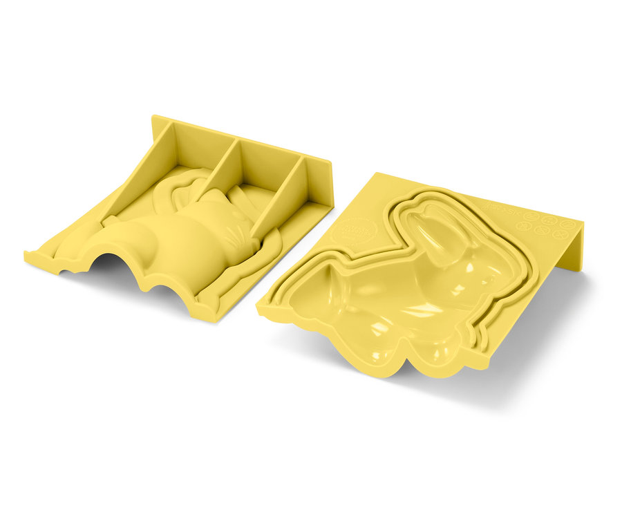 Két sárga nyúl alakú forma fekszik egy fehér háttéren.