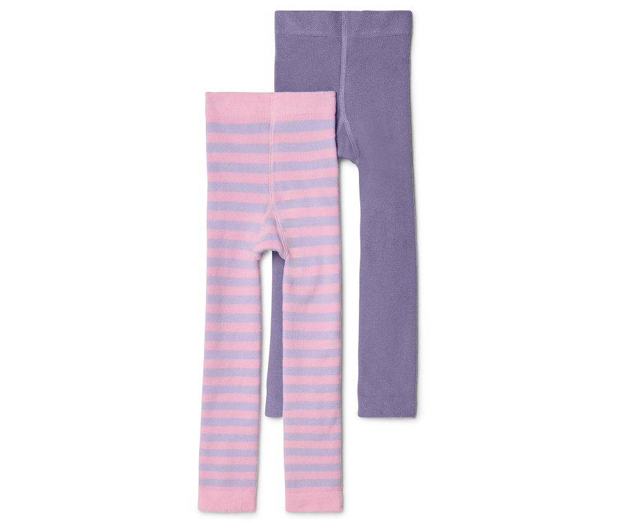 Két gyerek leggings fekszik fehér háttéren, egy lila és egy rózsaszín-lila csíkos.