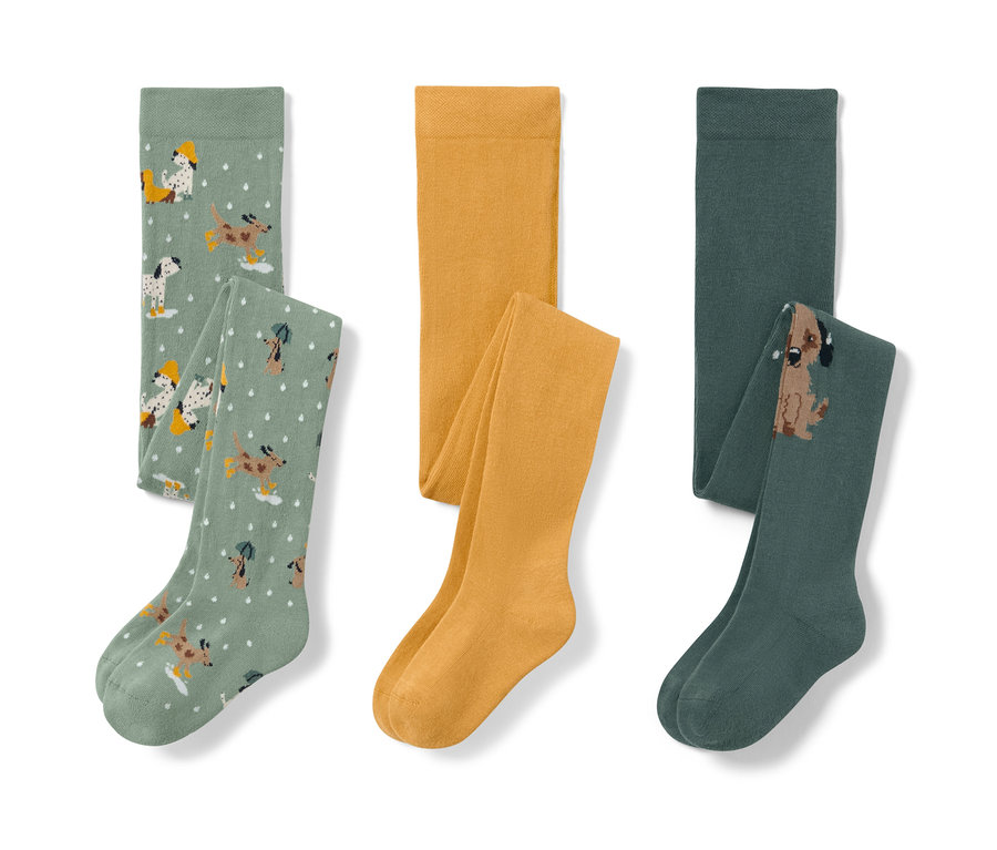 Három gyerek harisnyanadrág: világoszöld kutyás mintával, sárga és sötétzöld kutyával.