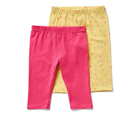 Két darab ¾-es gyerek leggings, egy rózsaszín és egy sárga, színes szórat mintával.
