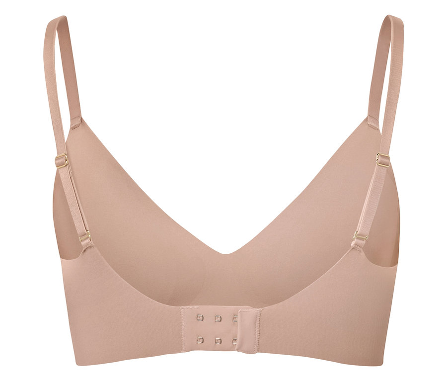 Egy testszínű melltartó hátulnézete, állítható pántokkal és kapcsos zárással.