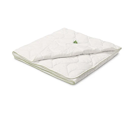 Összehajtott fehér irisette® greenline steppelt pamutpaplan.