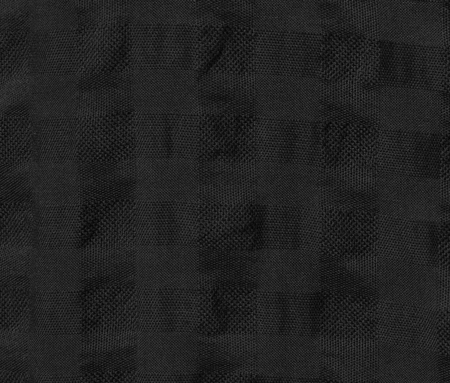 Egy fekete, szövött struktúrájú női tunika közeli képe.