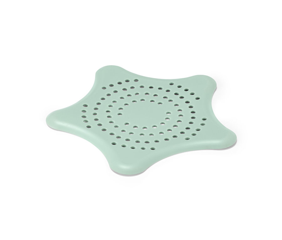 Egy mentazöld, csillag alakú lefolyószűrő.