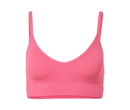 Egy rózsaszín, női seamless bustier melltartó közelről.