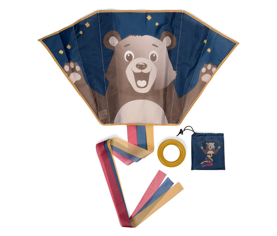 Kék sárkány medvével, sárga karika és kék borító ugyanazzal a nyomattal fehér háttéren.