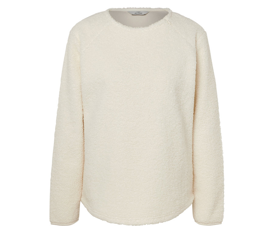 Egy krémszínű, hosszú ujjú fleece pulóver.