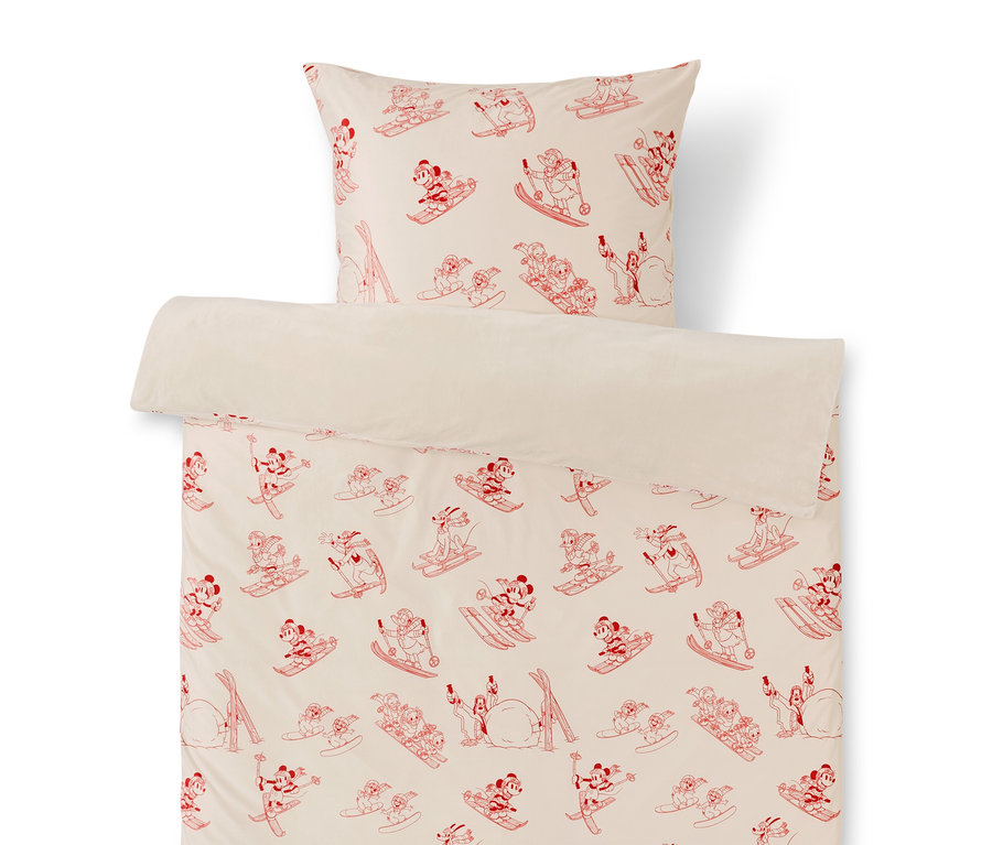 Ágynemű piros Mickey egér mintával síléceken és snowboardokon.