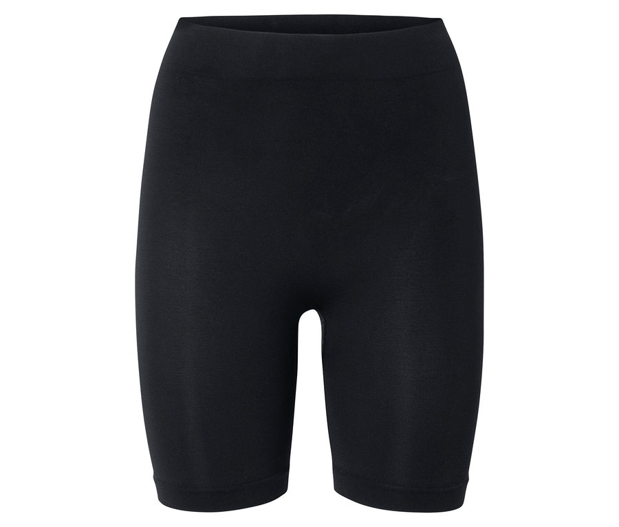Fekete, rövid leggings fekszik fehér háttér előtt.