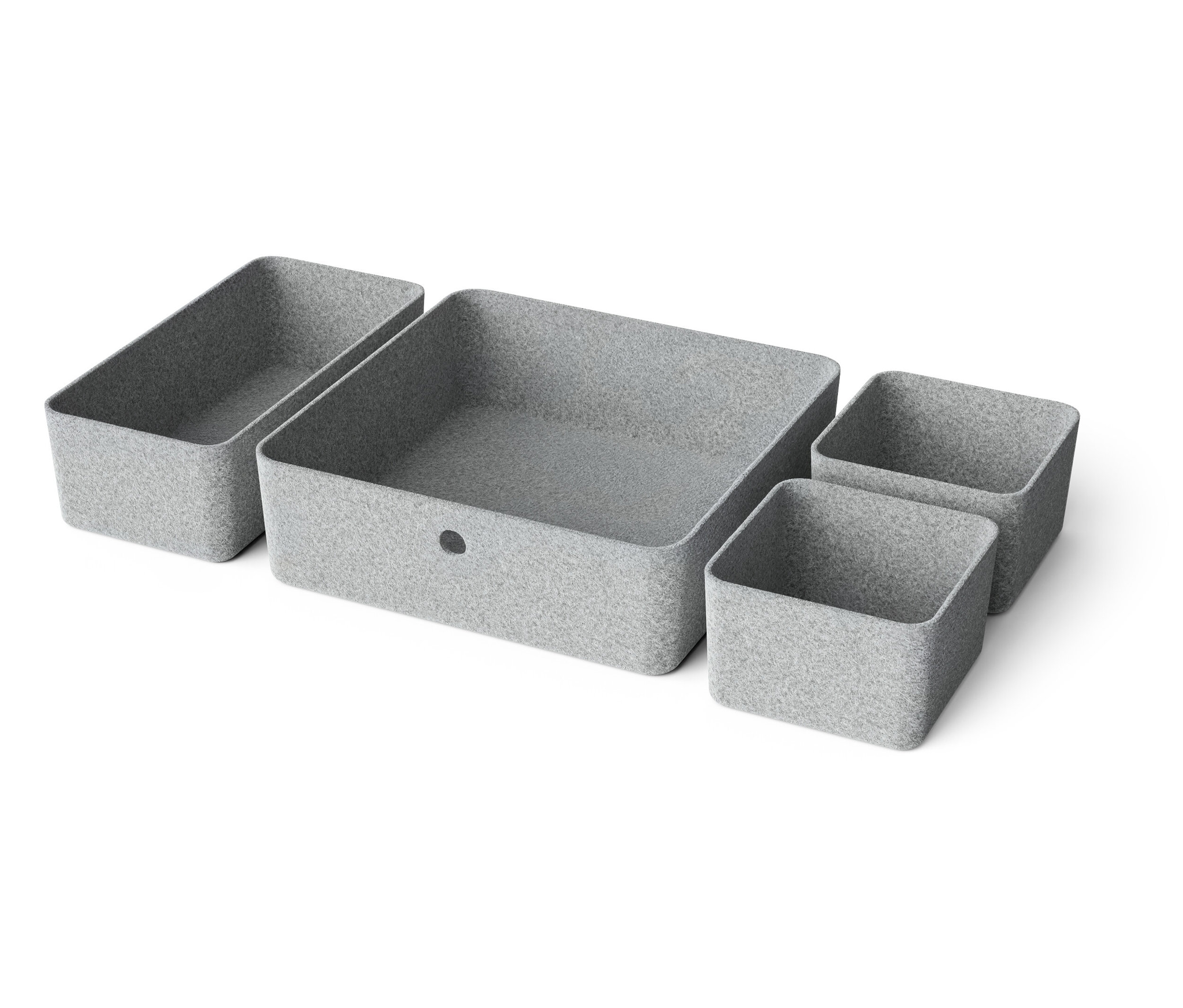 Négy különböző méretű szürke tárolódoboz elrendezve fehér háttéren.