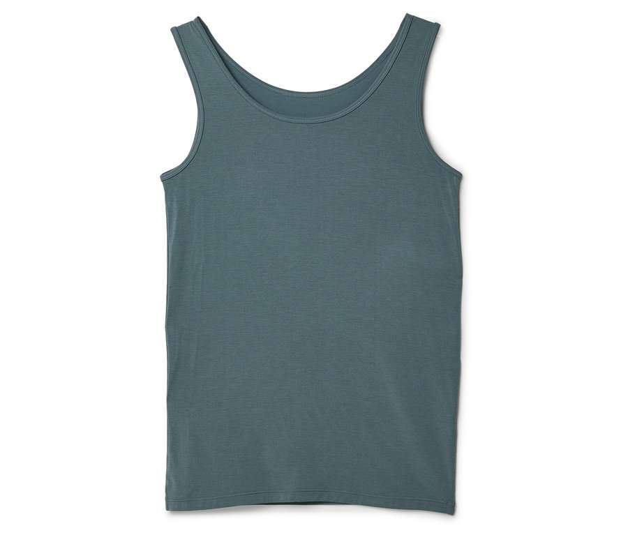 Szürke trikó fekszik egy fehér háttéren.