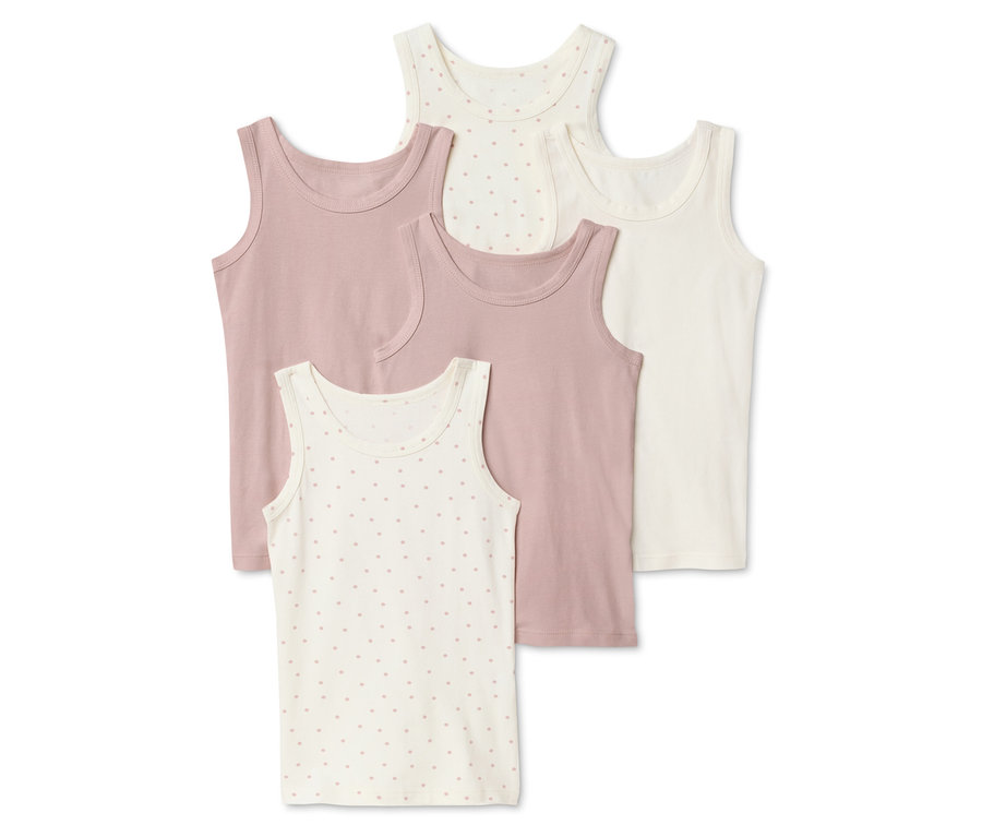 Öt ujjatlan felső púder rózsaszín, krém és fehér színben egymáson fekszik.