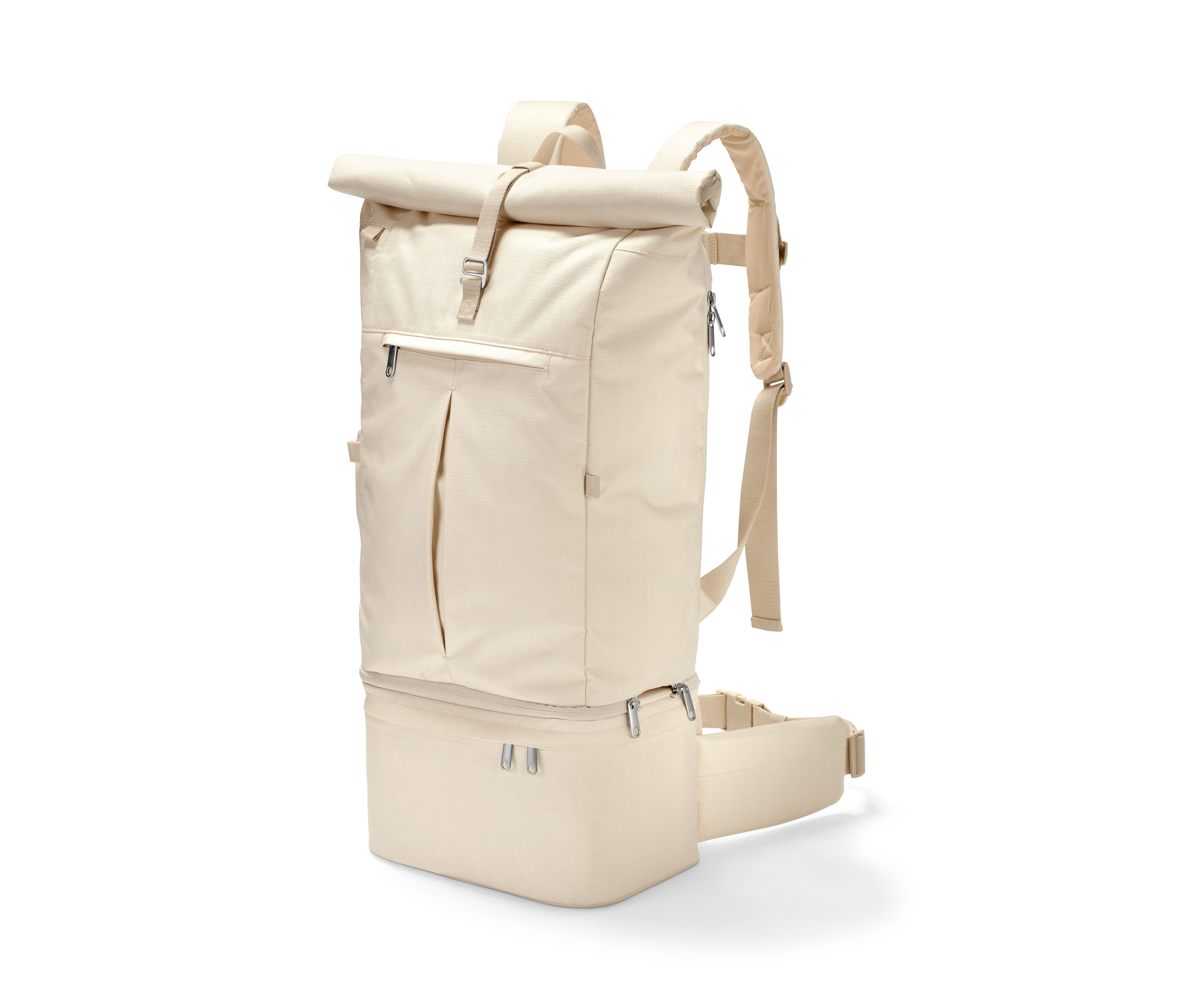 Egy bézs színű 3 az 1-ben hátizsák látható fehér háttér előtt.