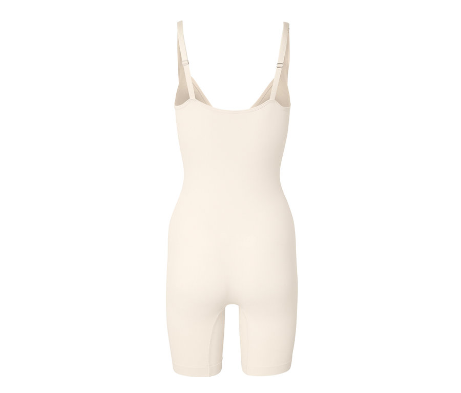 Egy krémszínű, mélyen kivágott női alakformáló body állítható pántokkal.