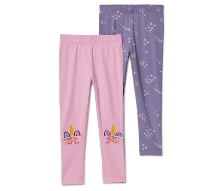 Rózsaszín leggings unikornisrátéttel lila, csillagmintás leggings mellett.