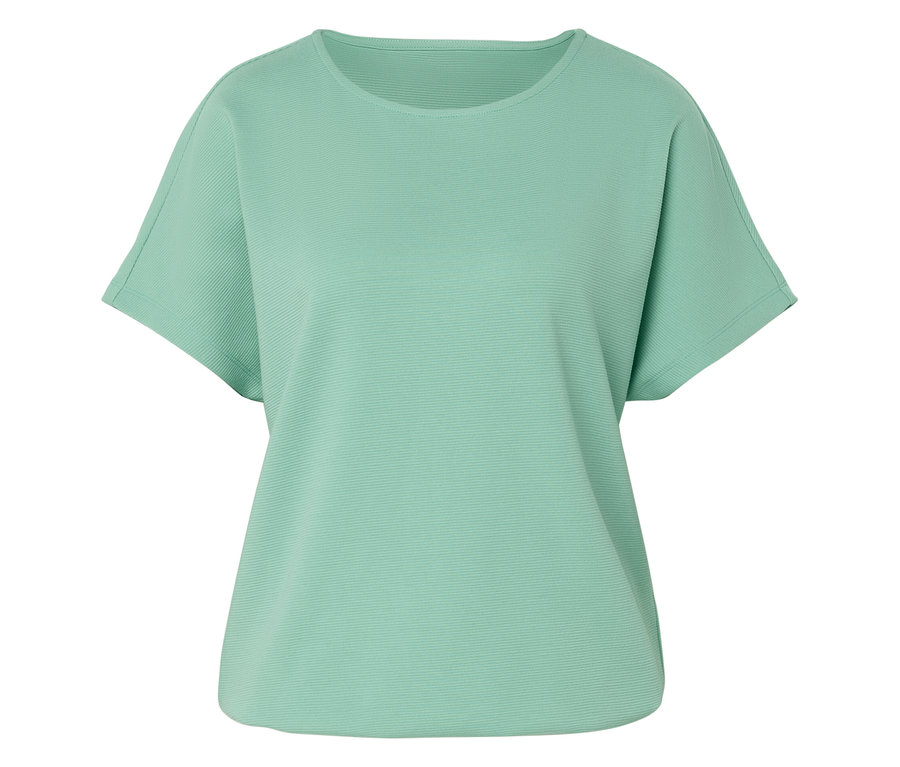 Egy világoszöld, rövid ujjú, kerek nyakú póló fekszik laposan.