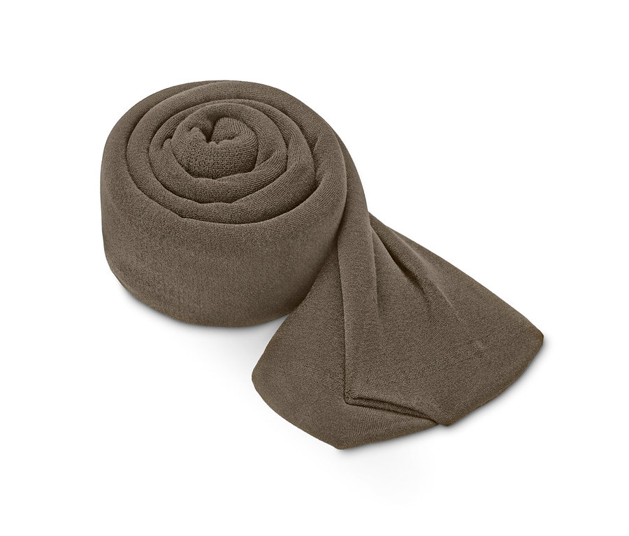 Egy feltekert női termo harisnyanadrág, 100DEN, taupe színben.